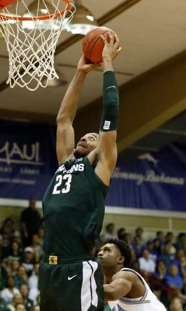 No. 4 Kansas outlasts Dayton in OT, wins Maui Invitational
